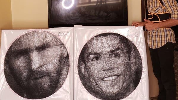 شاهد.. يمني يرسم بالخيط لوحتين لميسي وكريستيانو بوقت واحد