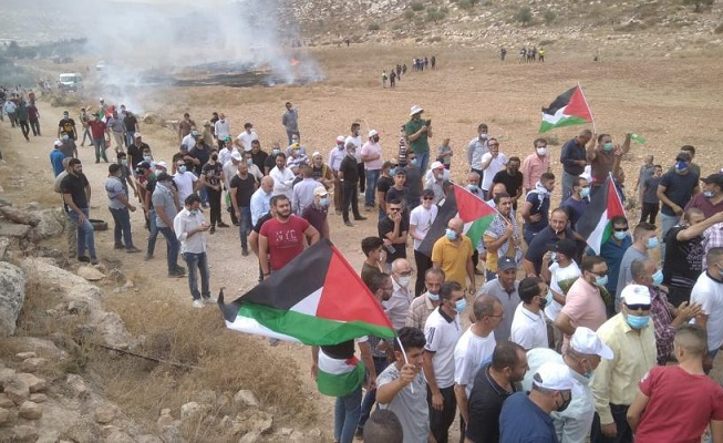 مسيرة في برقة تنديدًا بقرار عودة المستوطنين-الحياة الجديدة