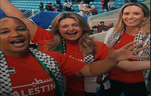 مشجعات أجنبيات في أمم آسيا يدعمن فلسطين
