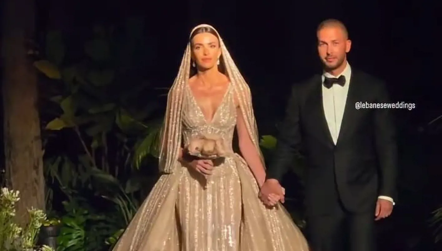 زين قطامي بفستان زفافٍ ثانٍ من توقيع إيلي صعب… إطلالة عنوانها الخلود الراقي