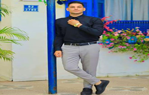 والدة بطل المصارعة علاء المدهون ترثي وحيدها بعبارات مثقلة بالشجن