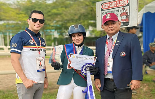 إلهام ظاهر .. فارسة فلسطينية تتألق في ماليزيا